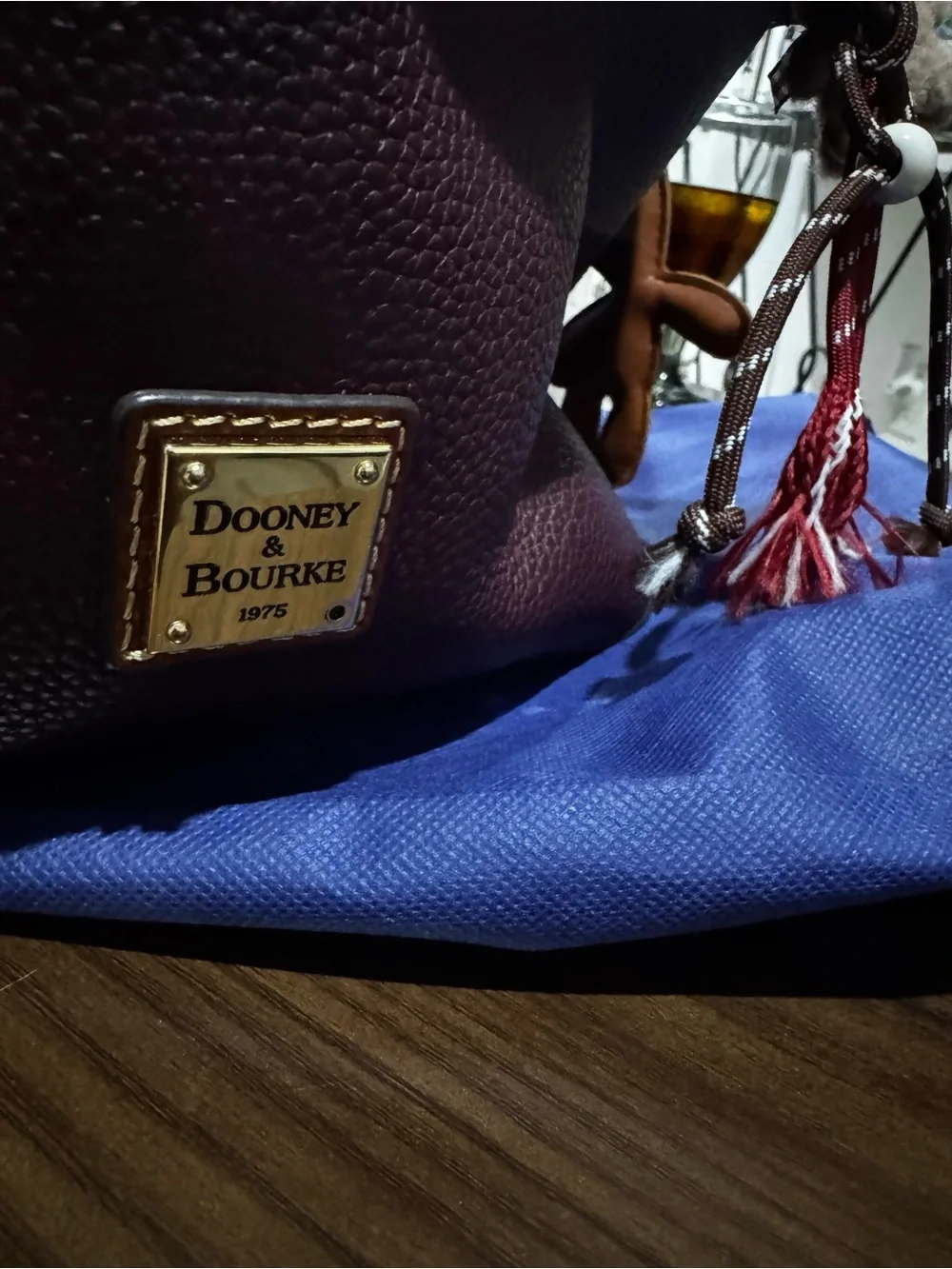 Dooney & Bourke Plum Pebbled Leather Drawstring Hobo with Tan Trim